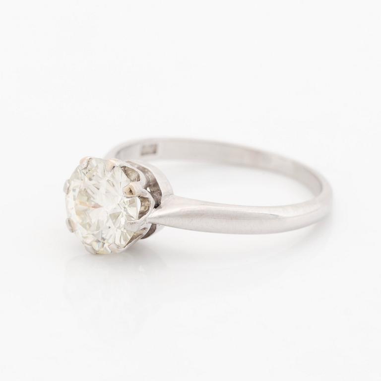 A platinum ring set with an old-cut diamond, by Wiwen Nilsson.