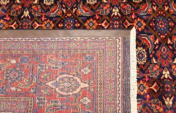 A Sarouk carpet, c. 406 x 302 cm.