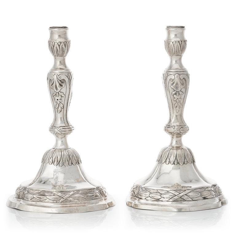 A matched pair of 18th century silver candlesticks, mark of Isak Trybom, Stockholm 1775 and.