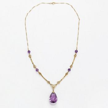 Kaulakoru, 14K kultaa ja ametisteja.