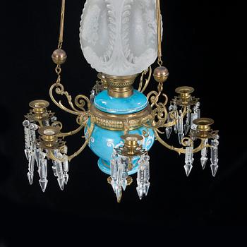 A late 19th century ceiling kerosene lamp.