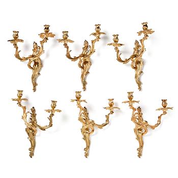 180. A set of six two-branch gilt bronze Louis XV-style appliques, 20th century.