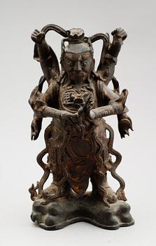 A bronze figure of a deity, late Ming dynasty (1368-1644).