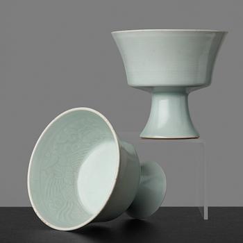 31. A pair of celadon glazed stemcups, China, 20th Century with Yongzheng mark.