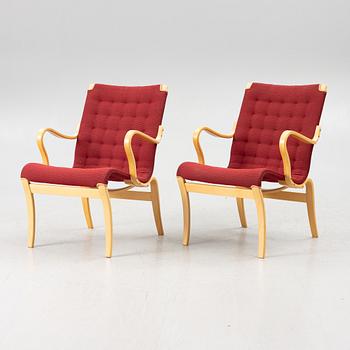 Bruno Mathsson, a pair of "Mina" armchairs, Bruno Mathsson International, second half of the 20th century.