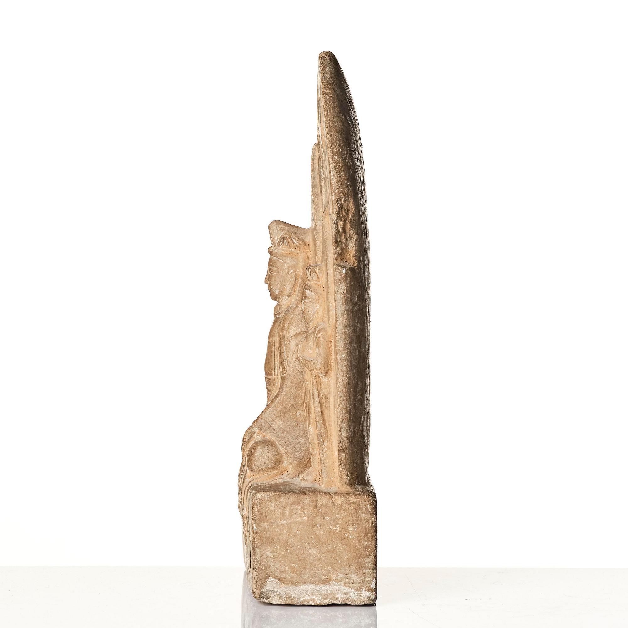 An inscribed limestone Buddhist stele, Tang style, with an inscription the third year of the Xian, corresponding to 672.