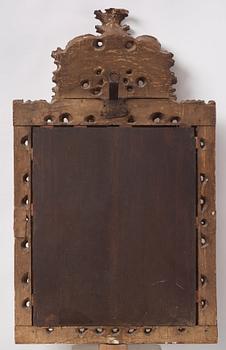 A baroque carved giltwood frame / mirror, circa 1700.