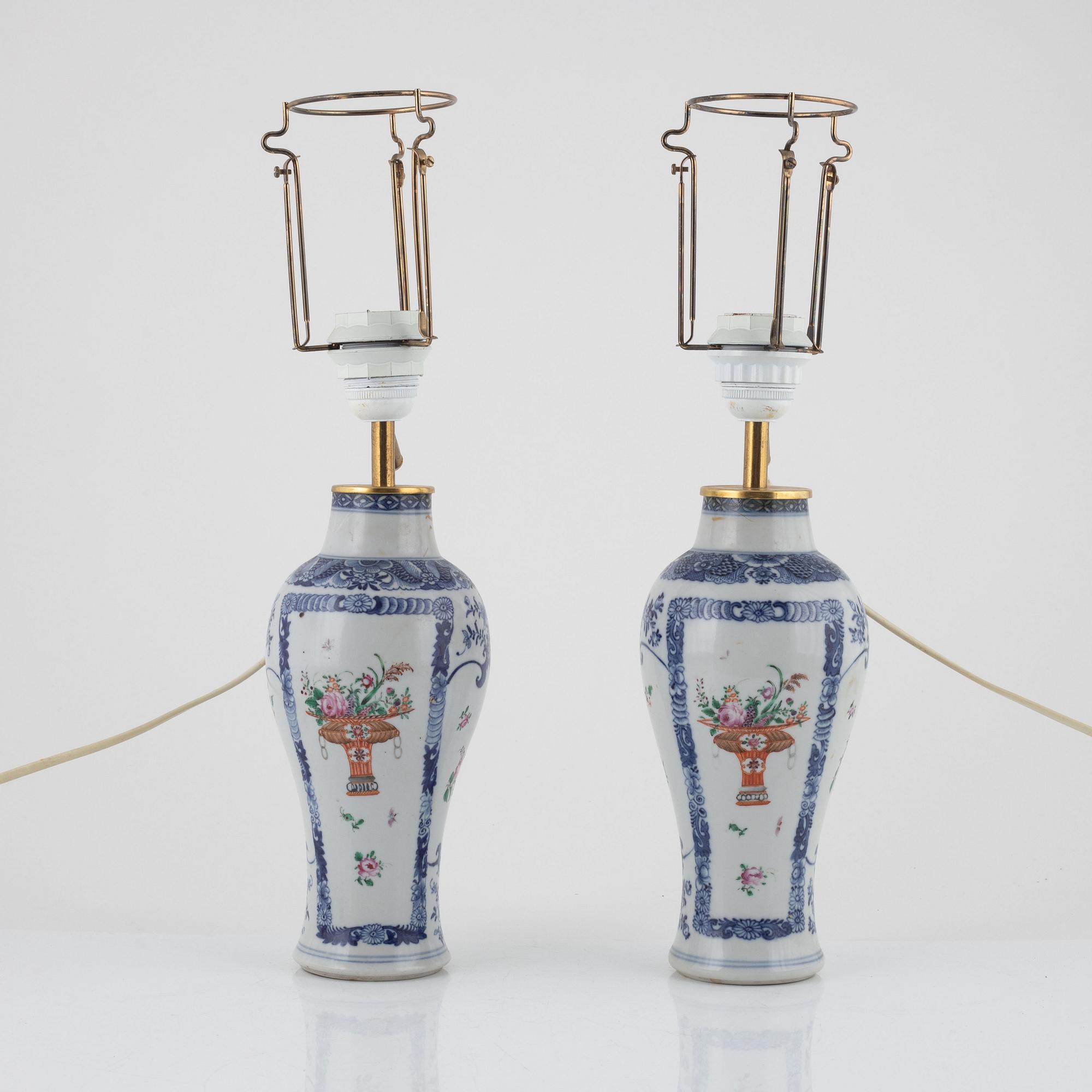 A pair of Chinese porcelain table lights/vases, 18th Century.