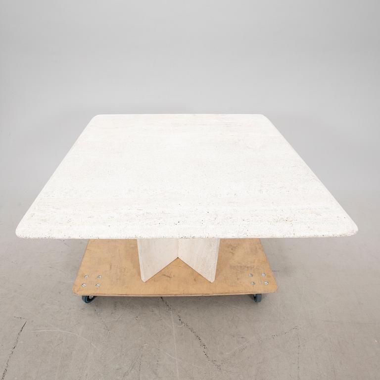 A polished travertine table from the second half of the 20th century.