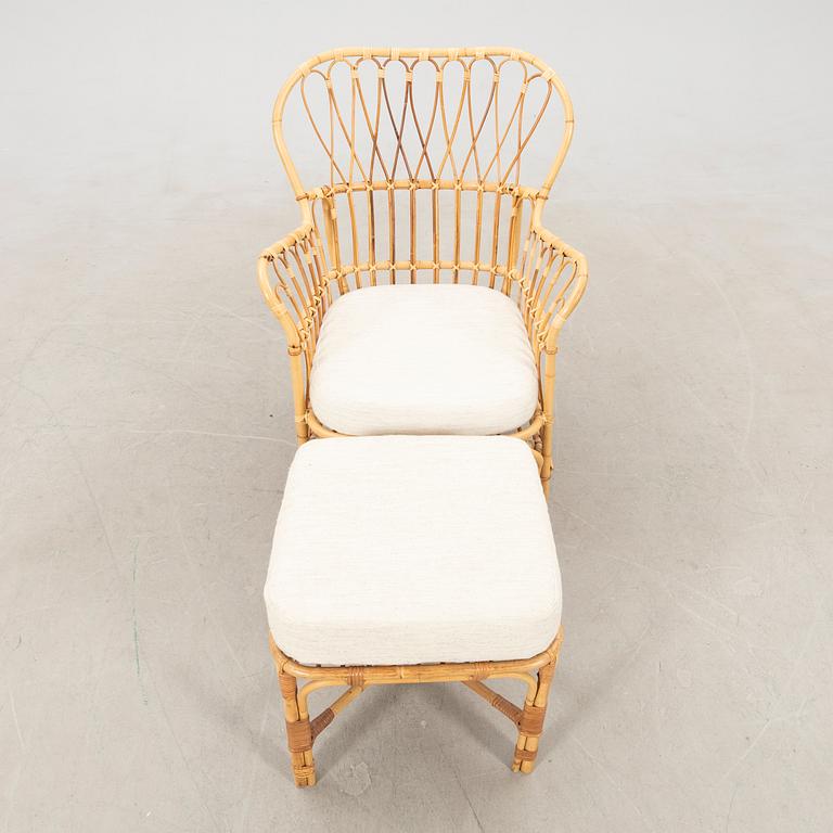 Josef Frank, wicker chair with stool model no. B 311 for Svenskt Tenn, second half of the 20th century.