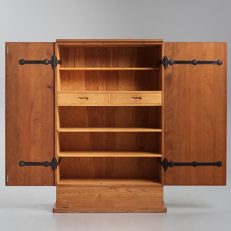 Axel Einar Hjorth, a "Lovö" stained pine cabinet, Nordiska Kompaniet, Sweden 1930s.