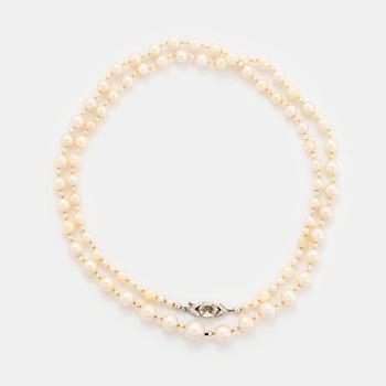 A cultured pearl necklace with a WA Bolin clasp.