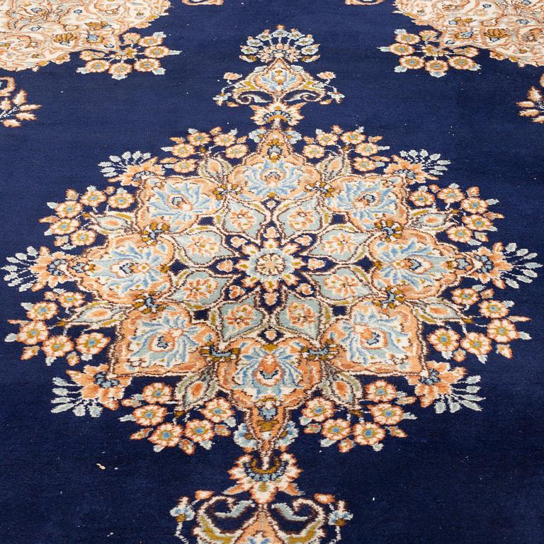 A carpet old Kerman, around 266 x 181 cm.