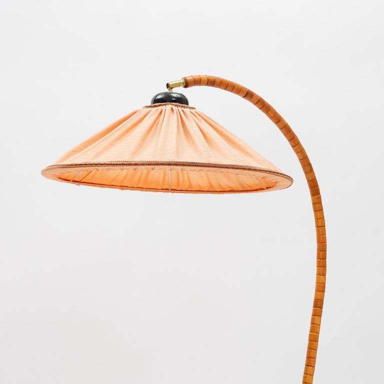 A stained beech floor light, Markslöjd, late 20th Century.