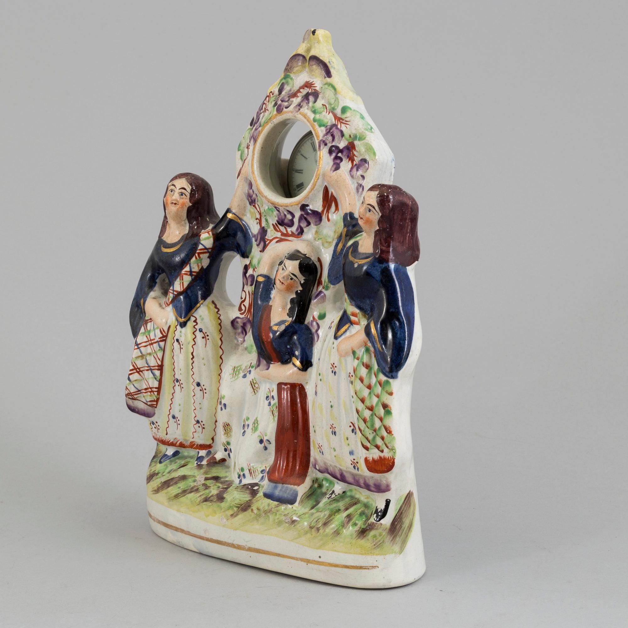 A fob watch stand, England late 19th century.