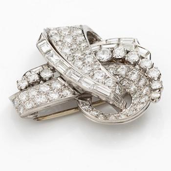 Broschclip platina med baguette-, åttkant- och runda briljantslipade diamanter, Art déco, Frankrike.