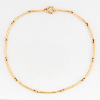 18K gold necklace.