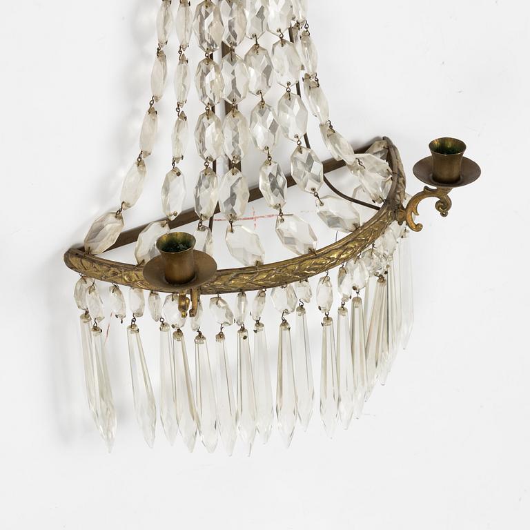 A pair of Gustavian style wall sconces, early 20th Century.