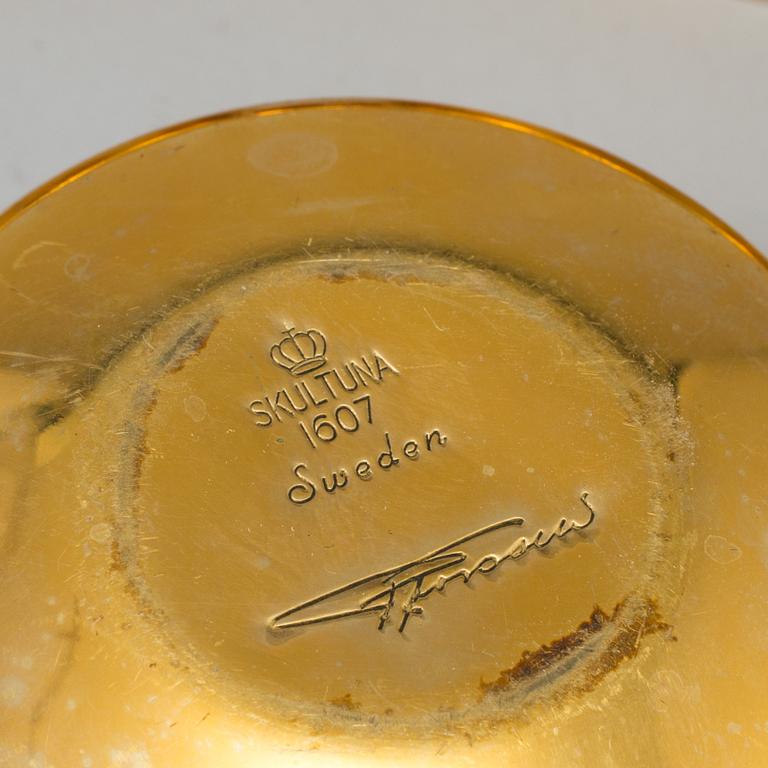 A set of eight brass drinking cups by PIERRE FORSSELL for Skultuna, Sweden.