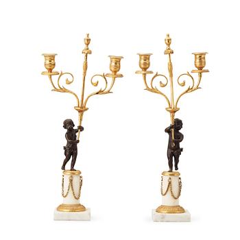 1283. A pair of Gustavian late 18th century two-light candelabra.