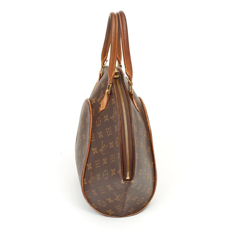 A monogram canvas handbag "Ellipse MM" by Louis Vuitton.