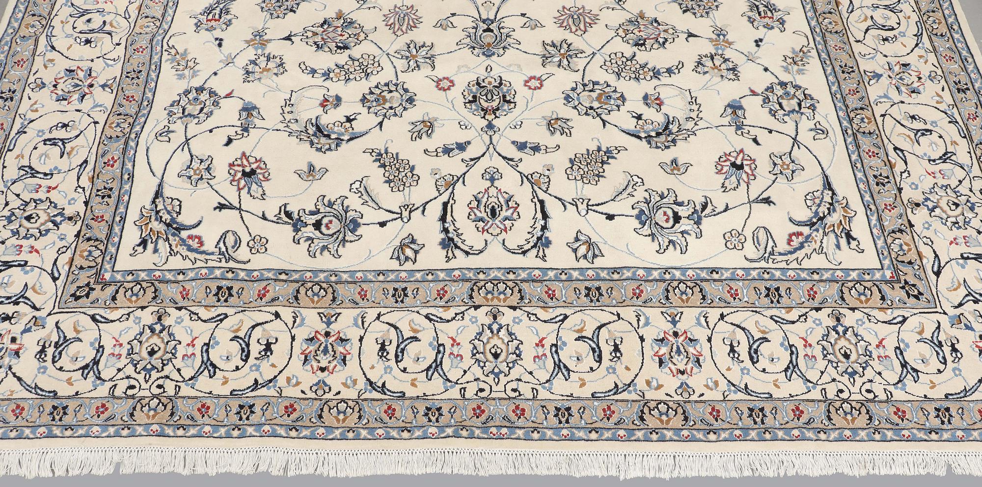 A carpet, Nain Part Silk, S.K 9 LAA, 340 x 250 cm.