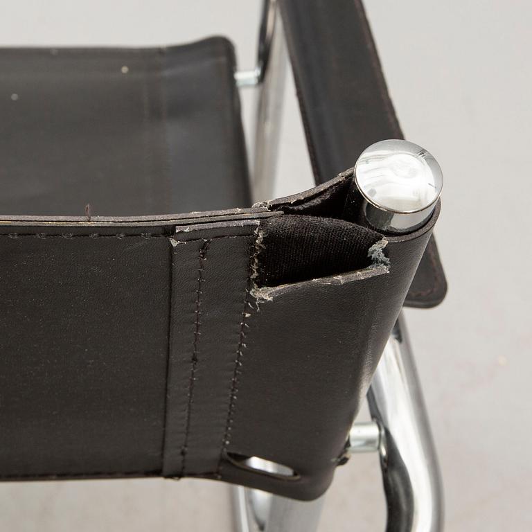 A set of five similar Italian 1970s chrome and leather armchairs.
