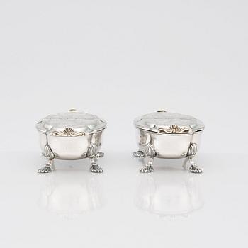 A pair of Latvian Rococo silver salt and pepper stands, marks of Johan Christian Henck (Henke), Riga 1768-80.