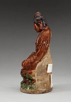 A ceramic figure of Buddha, Ming dynasty, 17th Century.