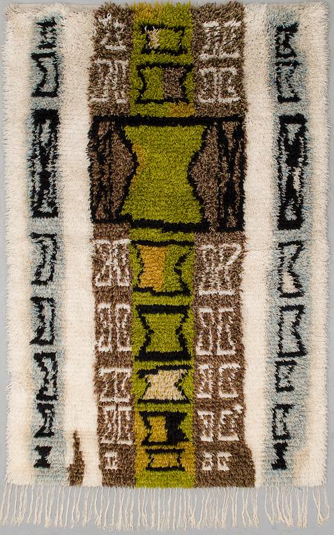 a Finnish long pile rug. Circa 157x105 cm. Design year 1956.