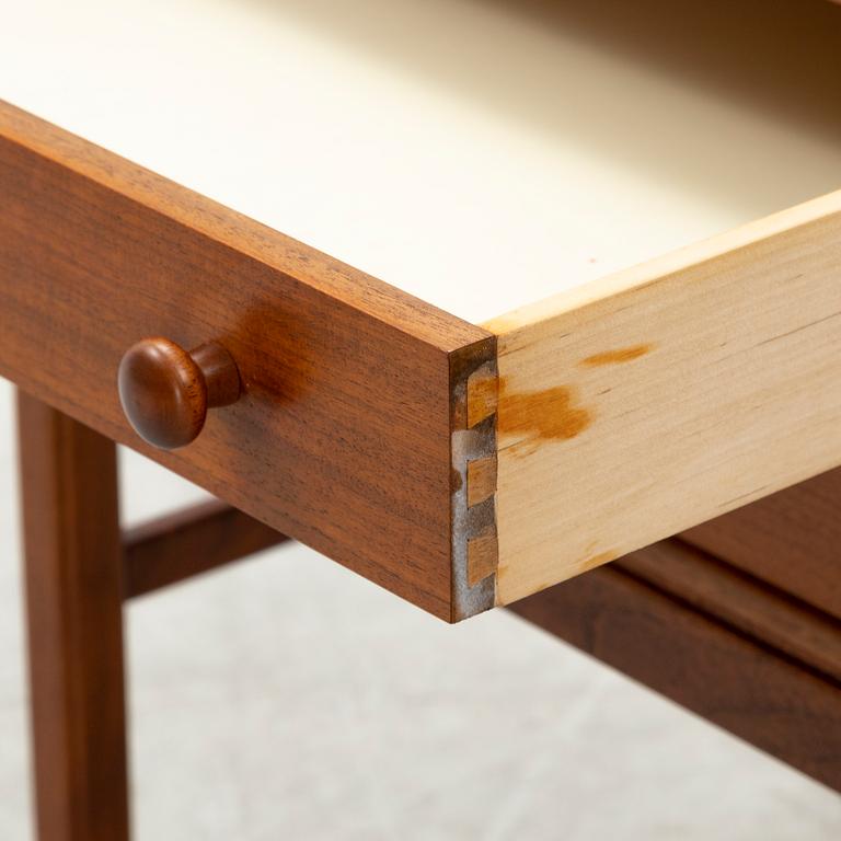 A teak and brass flowerstand with drawers by Myrstrand & Engström, 1960's.