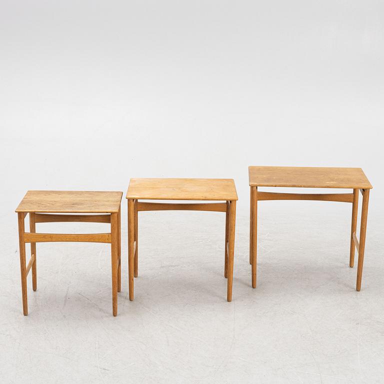 Hans J. Wegner, a nesting table, Andreas Tuck, Denmark, mid 20th Century.