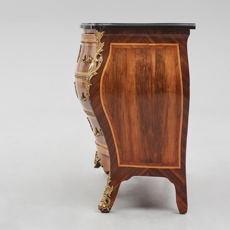 A rococo parquetry and gilt brass-mounted commode possibly by C. Åhman (master in Stockholm 1748-1783).