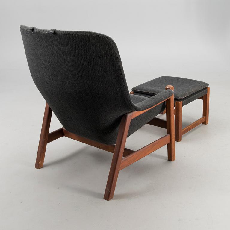 A 1960s 'Caravelle' armchair and ottoman for Puunveisto Oy - Träsnideri Ab, Finland.