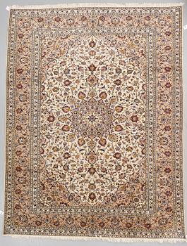 A carpet from Kashan, around 330 x 261 cm.