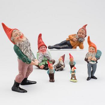 A lot of eight painted terracotta santa claus figurines first half of the 20th century.