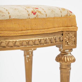 A pair of giltwood stools by E. Ståhl (master in Stockholm 1794-1820).