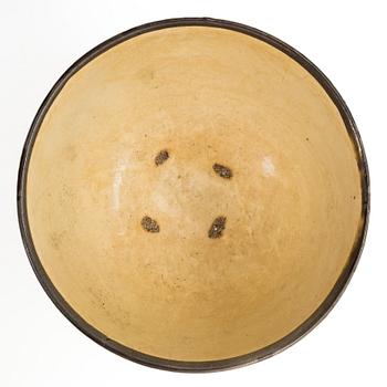 A creme glazed bowl, presumably Song/Yuan dynasty.