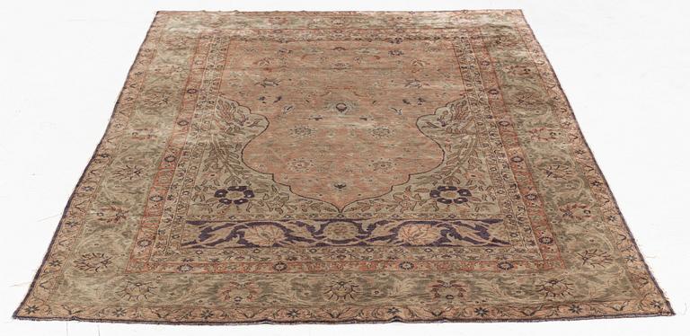 A Turkish rug, c. 185 x 125 cm.