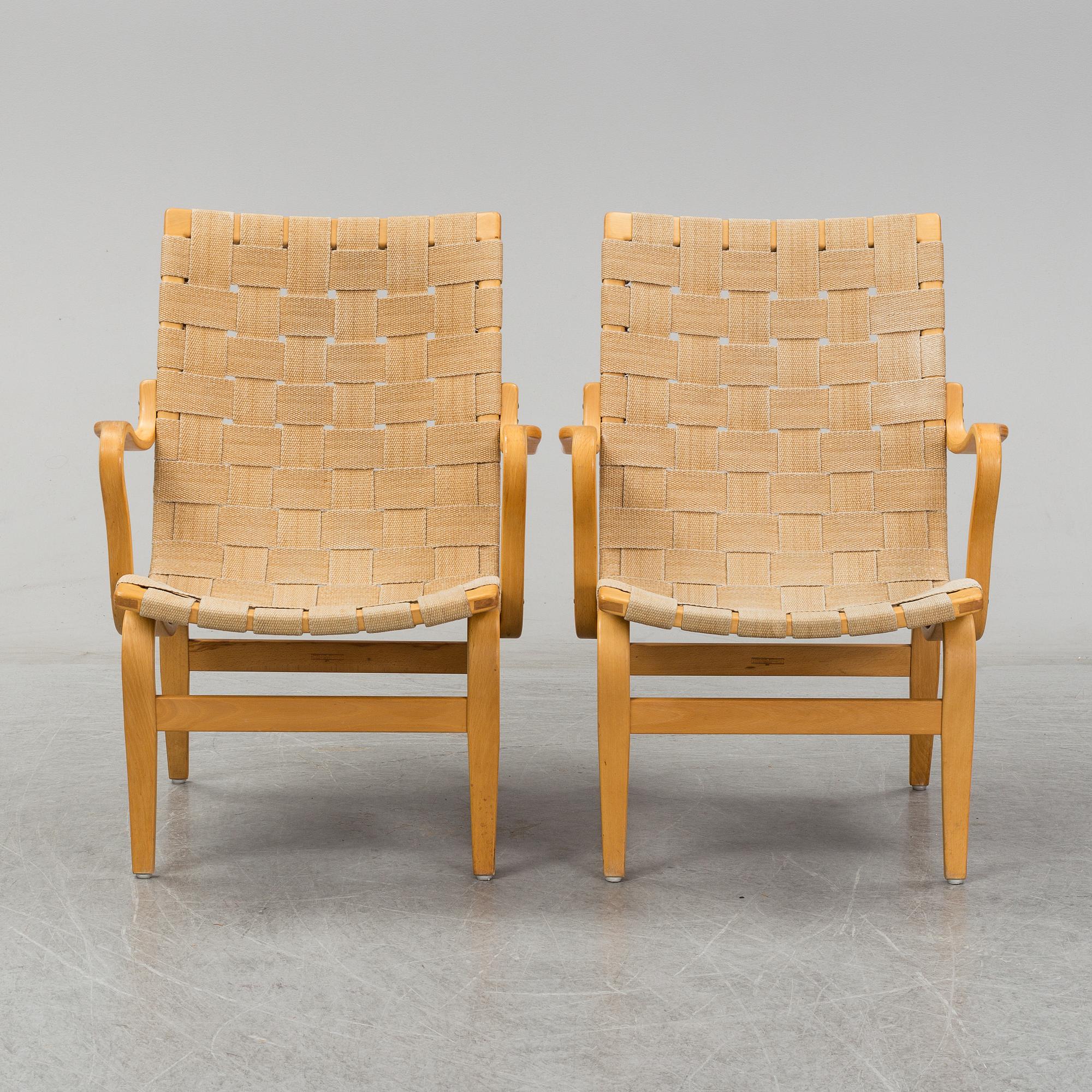 A pair of 'Eva' easy chairs by Bruno Mathsson, Firma Karl Mathsson, Värnamo 1973.