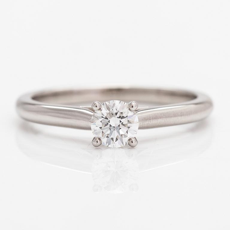 Cartier, a platinum ring with a diamond ca. 0.53 ct. Marked Cartier, FIK691 58. With certificate.