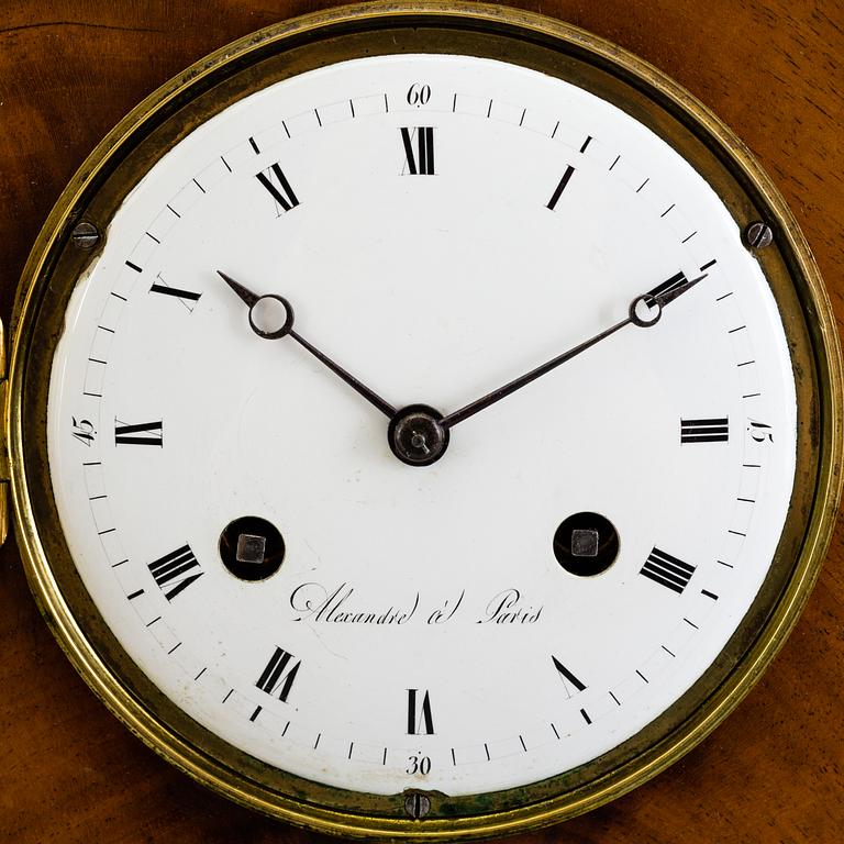 A French Empire mahogany mantle clock by Alexandre à Paris, first half of the 19th Century.