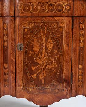 A pair of Louis XVI corner cupboards by Francois Gaspard Teunè (master in Paris from 1766), 18th century.