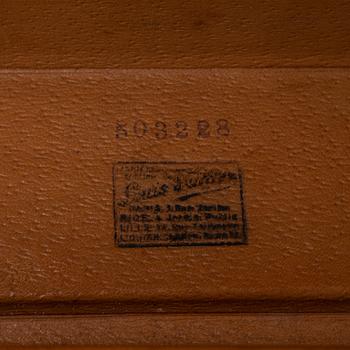 Louis Vuitton, a leather suitcase, first half of the 20th Century.