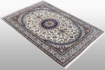 A rug, Nain, Part Silk, sk 6 LAA, ca 204 x 137 cm.