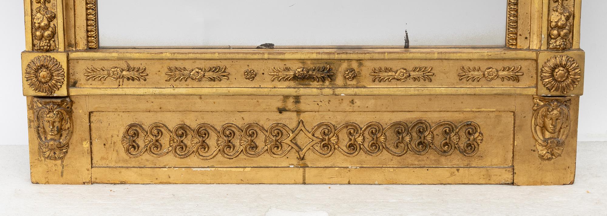 Empire, A late Empire mirror, first half of the 19th century.