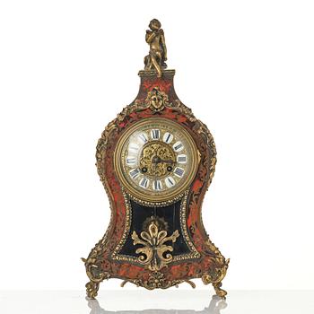 A Rococo-style mantle clock, around 1900.