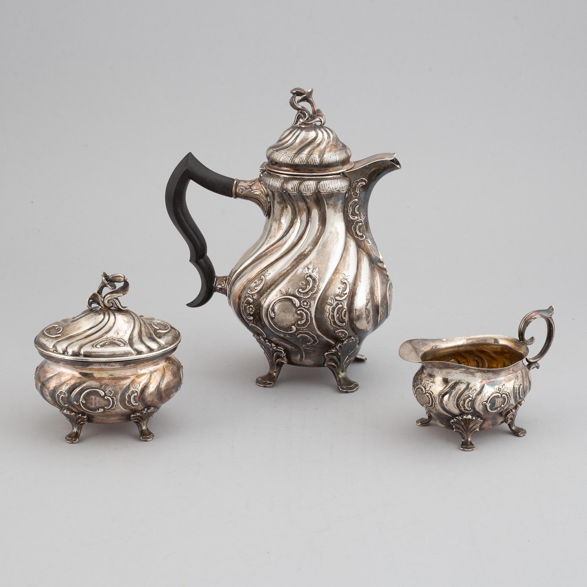 Cg Hallberg, a Rococo style three piece silver service, Stockholm 1951,