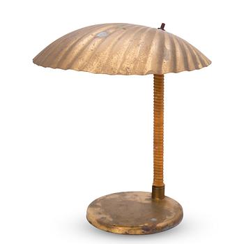 286. Paavo Tynell, A DESK LAMP. A shell.  Manufactured by Taito Oy. Designed in 1938/39.