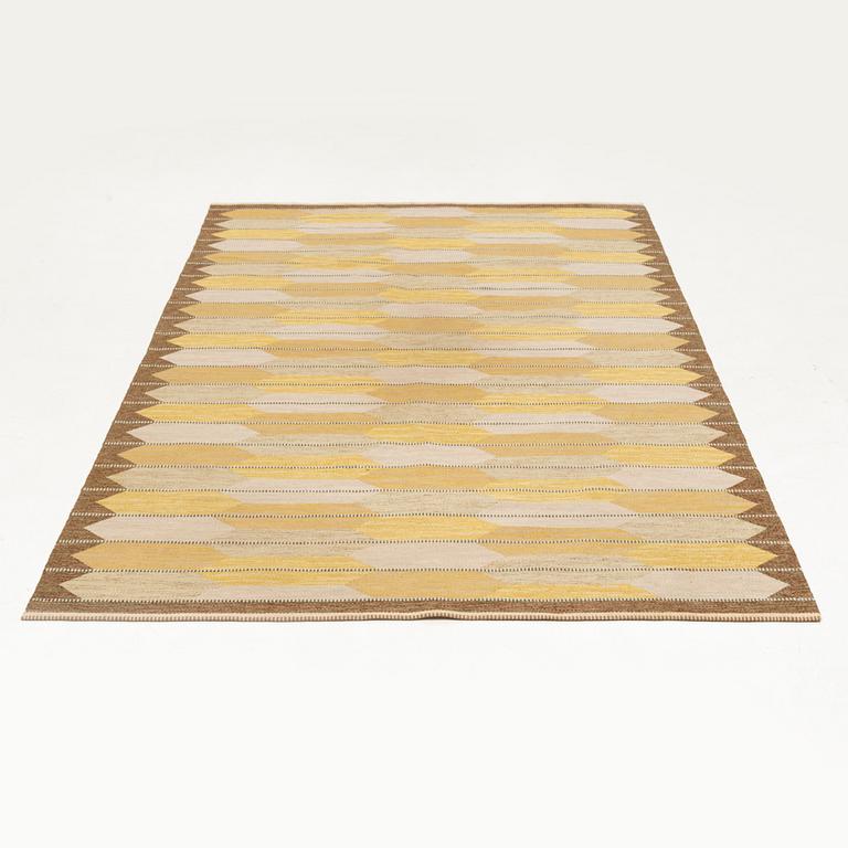 Berit Koenig, a flat weave rug, unsigned, c. 306 x 198 cm.